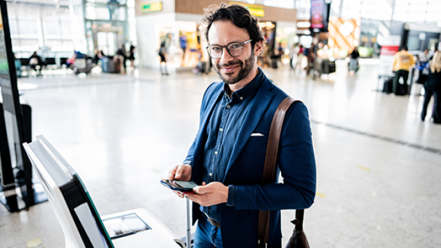 Man standing in an airport