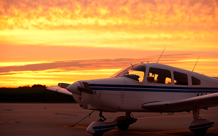 plane at sunset