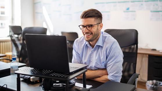 man looking at computer screen