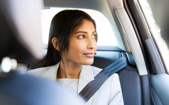 Lady in a car looking out of the window